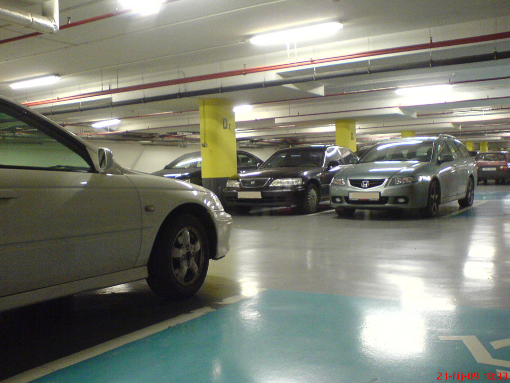 Sešlost v garážích Centra Smíchov